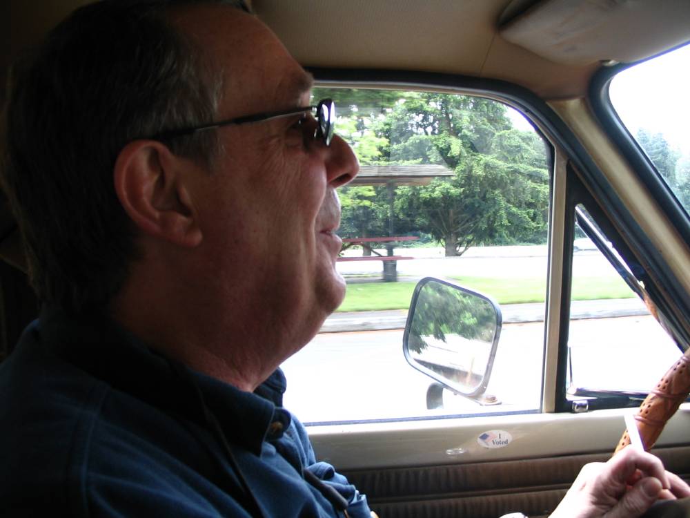 FL Decker driving a vehicle with sunglasses on